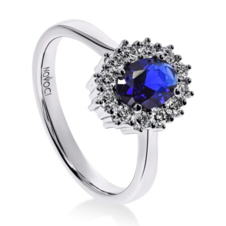 INSIGNIA Halo-Ring aus Gold, Ovaler Blauer Saphir 1,00 ct mit Akzentdiamanten